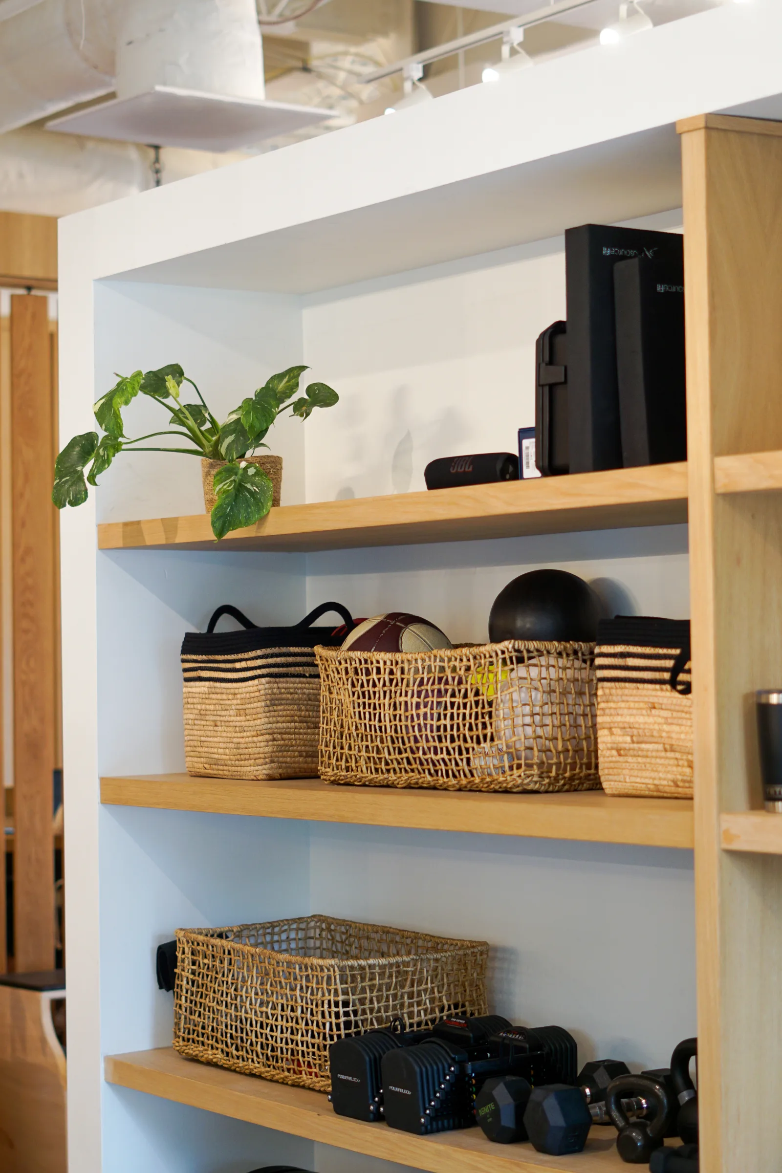 Organized strength, recovery, and movement equipment shelves at Great Falls Movement Center