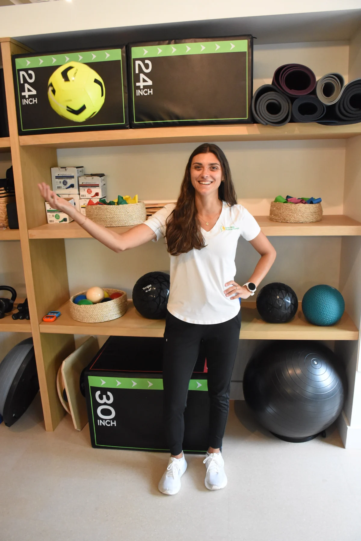 Great Falls PT therapist with sports-training equipment